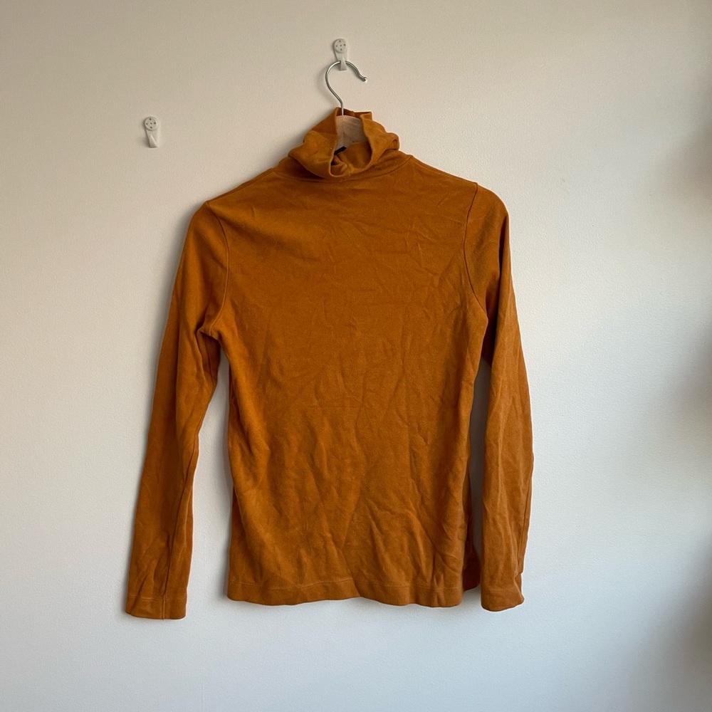 Orange Uniqlo heat tech turtleneck